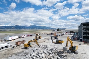equipment at work - concrete ramp demolition 